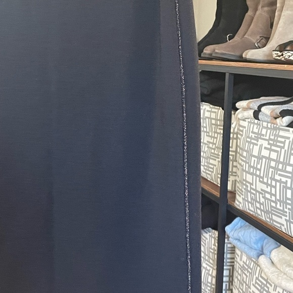 Marc Cain knit black knee length skirt with metallic silver side seams. - Picture 5 of 14